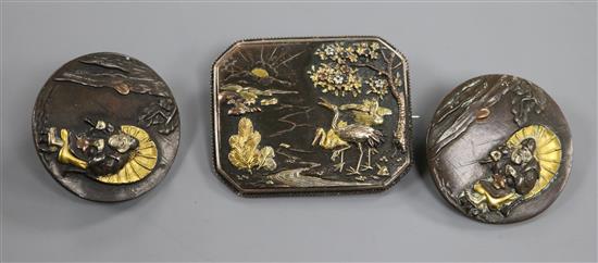 A Japanese mixed metal brooch and two similar buttons